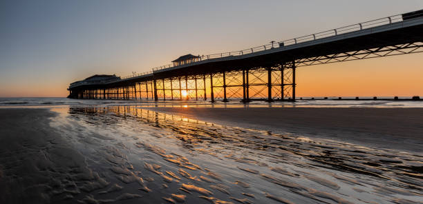 istock cromer pier sunrise. 1023031600