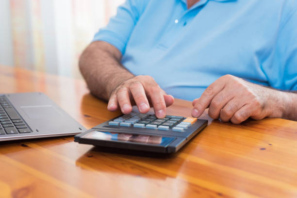 istock Man doing his accounting, financial adviser. 1023034796
