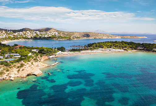 The famous celebrity beach Astir at Vouliagmeni district in south Athens, Greece, with turquoise water and fine sand