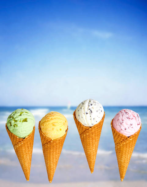 istock Ice cream cones on blue beach background 1023047586