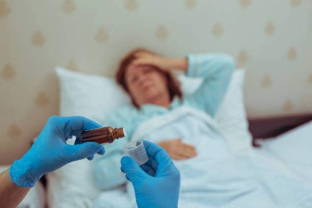 istock Doctor giving to a patient medicaments 1023066076