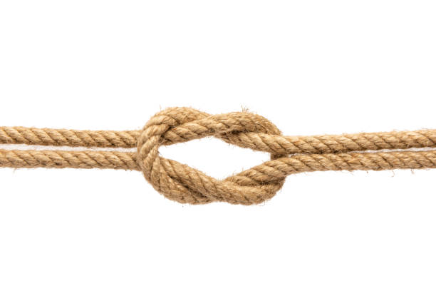 capstan knot made of black rope on a white background