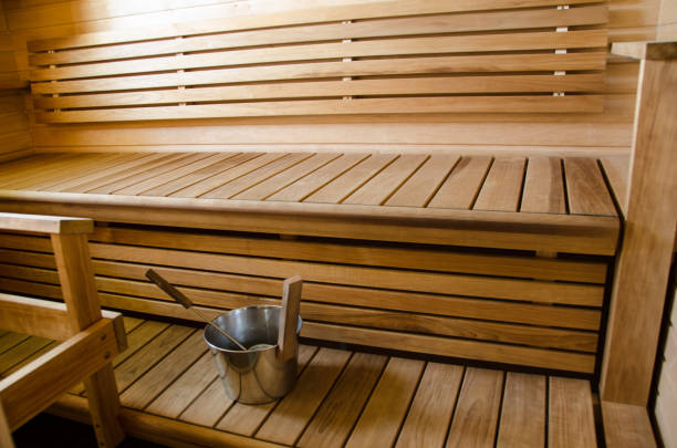 istock Sauna with sunlight and a bucket 1023069912
