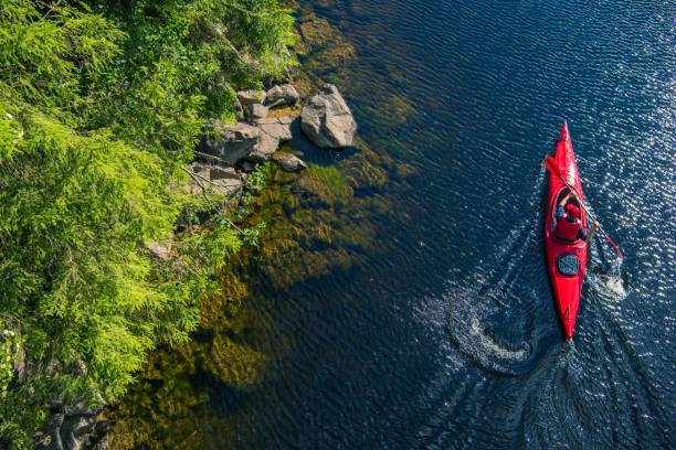 river kayaker aerial view - caiaque imagens e fotografias de stock