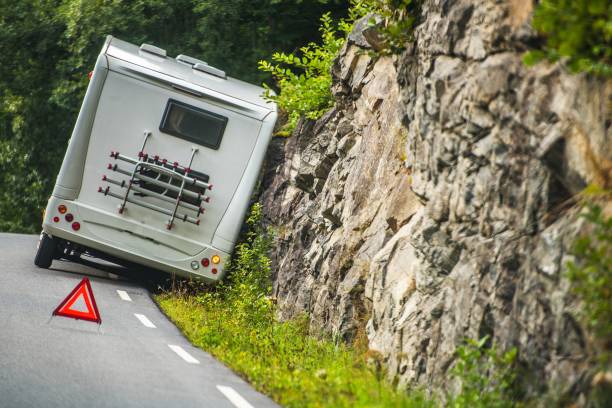 RV Camper Van Accident RV Camper Van Accident on the Winding Mountain Road. ditch stock pictures, royalty-free photos & images