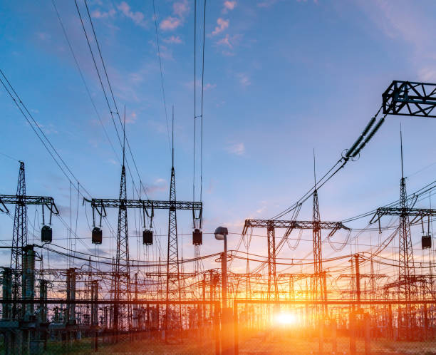 istock distribution electric substation with power lines and transformers, at sunset 1023078400