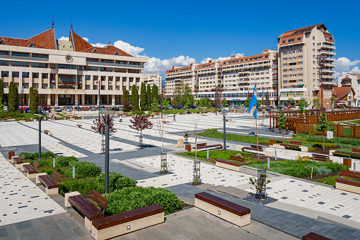 Stock photograph of downtown Miercurea Ciuc (Csikszereda) with the city hall building, Transylvania, Romania on a sunny day.