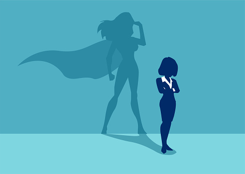 Vector of a strong business woman with a shadow imagining to be a super hero