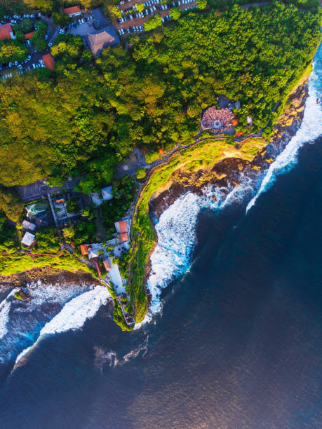 istock Uluwatu Temple aerial view at sunset 1023100608