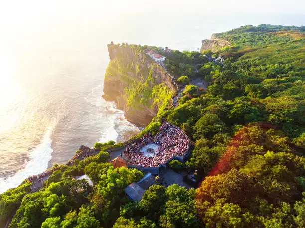 Uluwatu Temple aerial view at sunset by drone