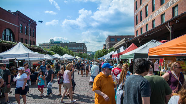 Saturday August 18th 2018 at the Old Market farmers market in Omaha Nebraska USA people are shopping for fresh produce and goods.