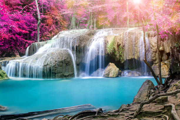 istock Amazing waterfall in colorful autumn forest 1023115064