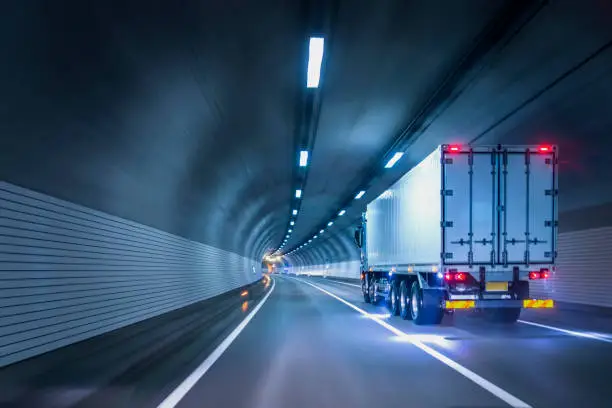 Truck passing through tunnels for safe and fast transport