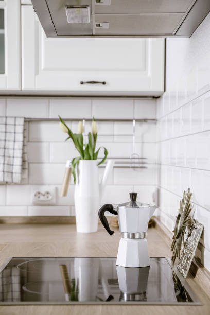 istock Scandinavian interior design. Coffee maker. White grey kitchen room organization 1023127548