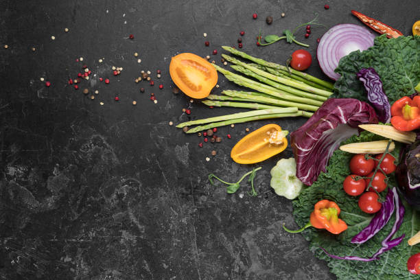 istock Food background. Fresh farmer vegetables at dark beton table. Space for text. 1023127632