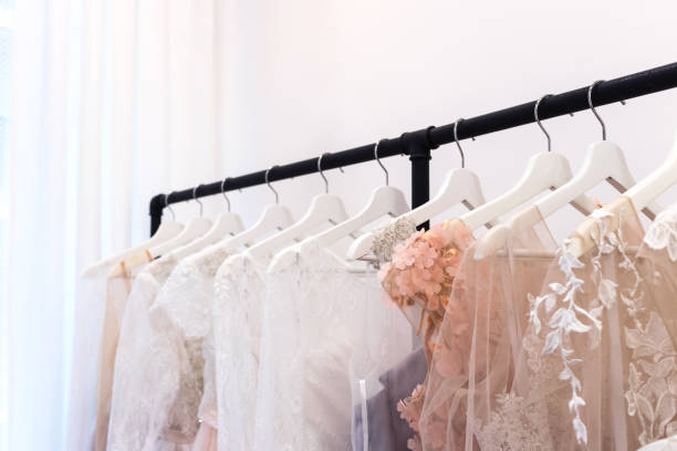 istock Wedding bride dress in the salon fitting room 1023128314