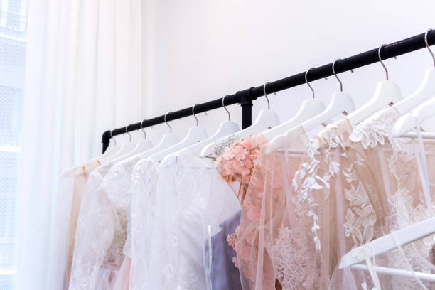 istock Wedding bride dress in the salon fitting room 1023128414