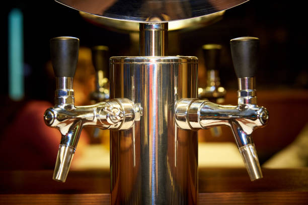 istock Golden taps for bottling beer on a blurry background close-up 1023128482