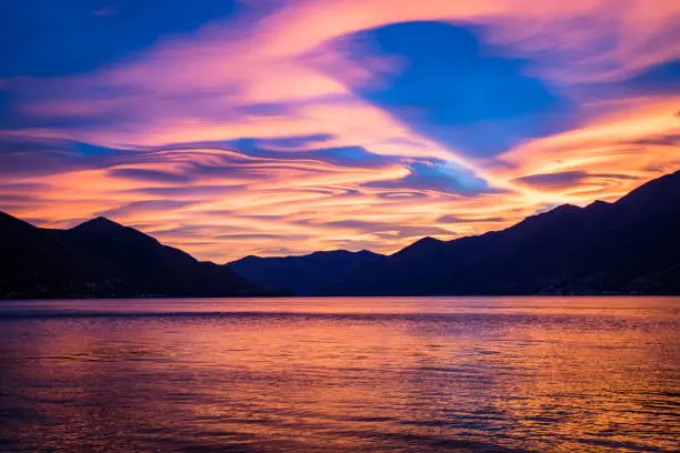 Spectacular Sunset at the Lago Maggiore with ufo clouds