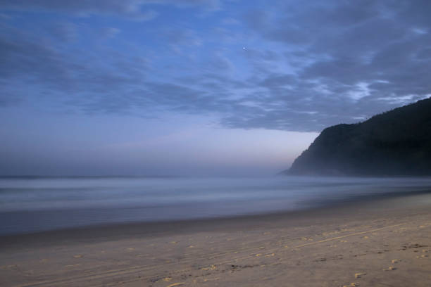 istock Beach fog colorful sunset long exposure 1023146404