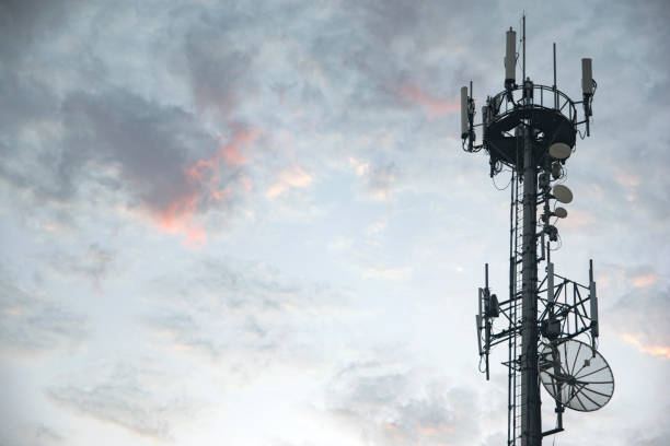 istock Antenna Tower transmission against a colorful sky with clouds 1023149762