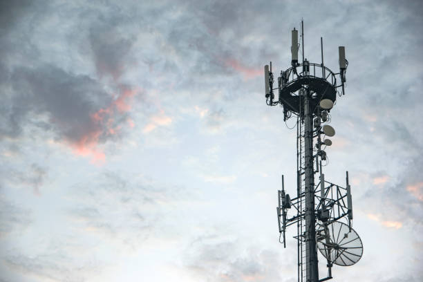 istock Antenna Tower transmission against a colorful sky with clouds 1023149764