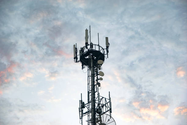 istock Antenna Tower transmission against a colorful sky with clouds 1023149780