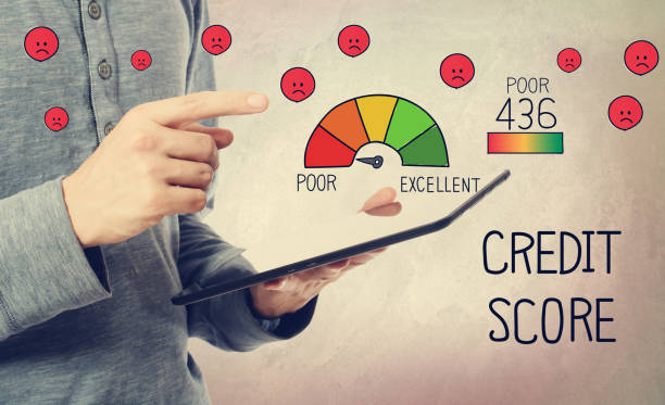 istock Poor Credit Score with man holding a tablet 1023159016