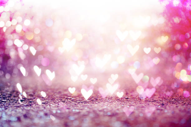 istock Beautiful shiny hearts and abstract lights 1023159050