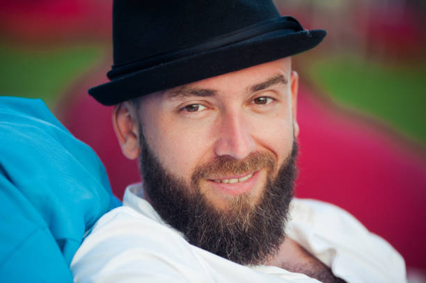 istock Stylish bearded man in hats 1023168146
