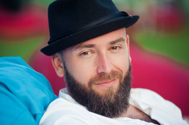 istock Stylish bearded man in hats 1023168170