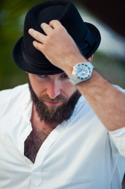 istock Stylish bearded man in hats 1023170842
