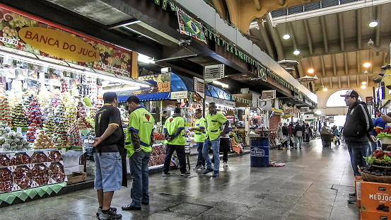 Sao Paulo, Brazil, June 16, 2018. People buying fruits at Municipal Market in downtown Sao Paulo, Brazil.
