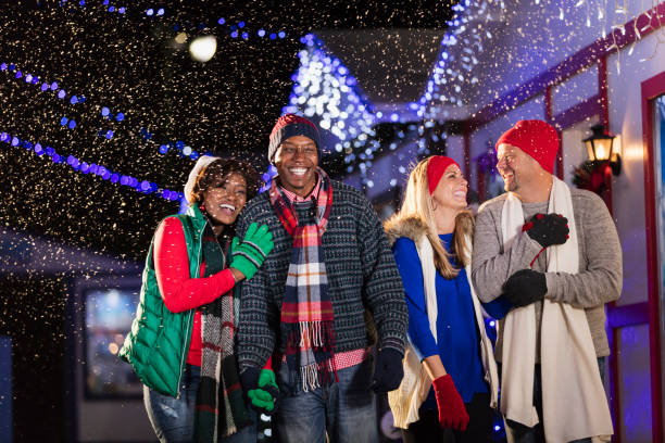 istock Multi-ethnic adults enjoying winter festival 1023189780