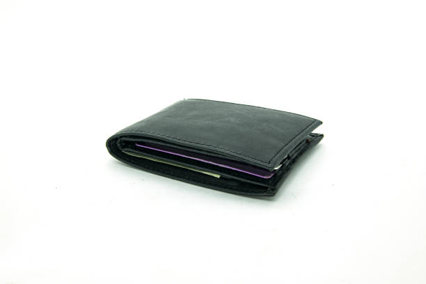 istock black closed wallet with credit cards isolated in white background 1023194762