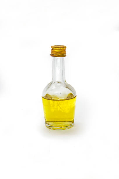 istock glass bottle with perfume isolated 1023194844
