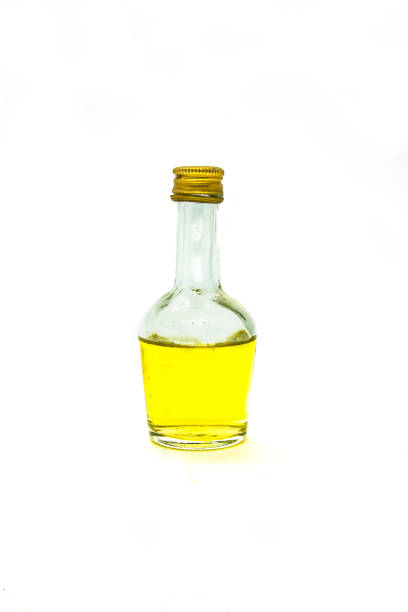 istock glass bottle with perfume isolated 1023194848