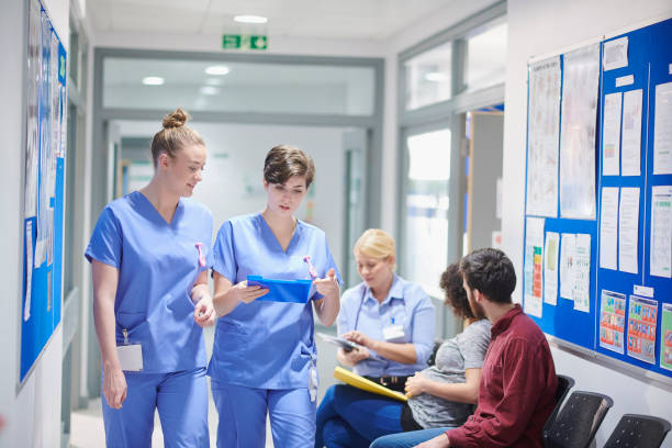 istock medical clinic team walking 1023211874