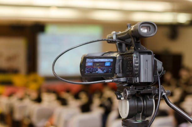 istock Video Camera recording seminar or learning in Conference room with blurred background, copy space 1023221200