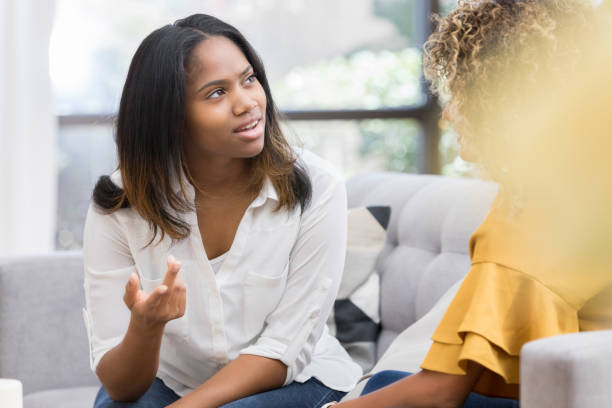 istock Young woman discusses something serious with friend 1023229474