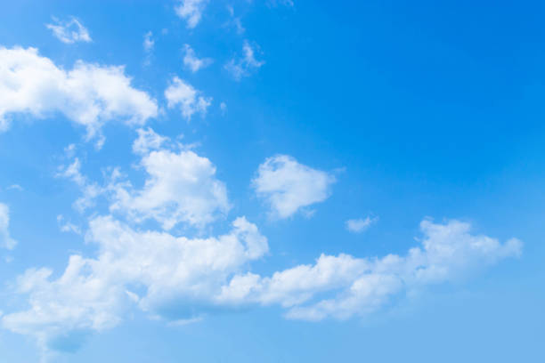 istock Blue sky filled with clouds floating over the city. 1023253084