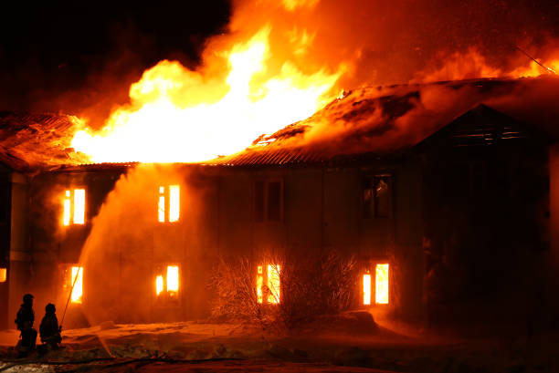istock Burning wooden house 1023280722