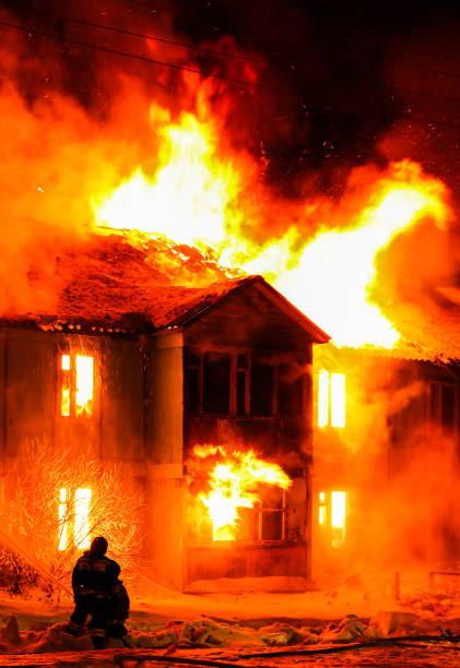 istock Burning wooden house 1023280744