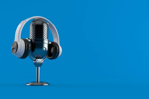 Radio microphone with headphones Radio microphone with headphones isolated on blue background. 3d illustration podcasting photos stock pictures, royalty-free photos & images