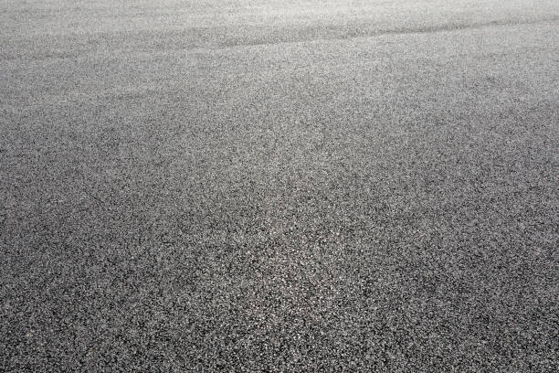 黒いアスファルト道路背景テクスチャ - 水平アングル ストックフォトと画像