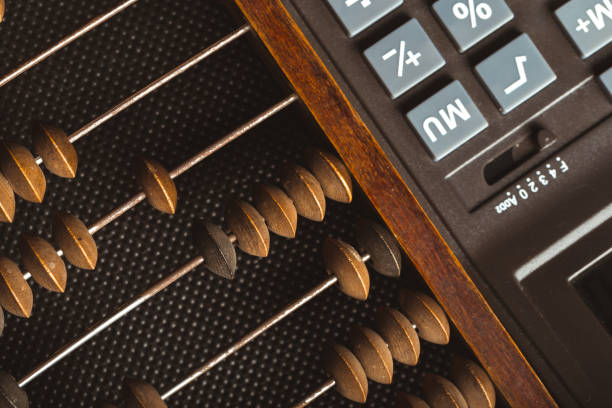 istock vintage abacus and calculator 1023310356