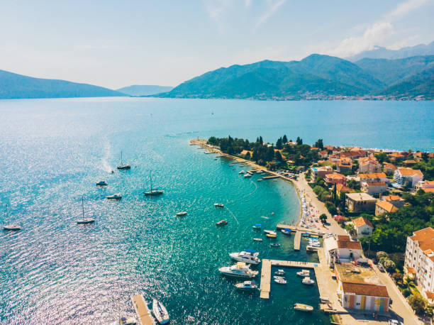aerial view of city on seaside in montenegro. mountains on background stock photo