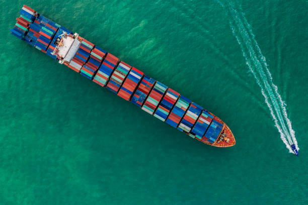 istock a cargo ship carrying multi-stack of containers in sea aerial view 1023314190