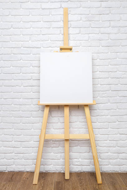 istock Wooden easel in the room 1023317666