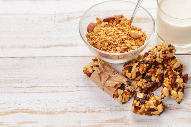 istock Granola bar on wooden background 1023321986